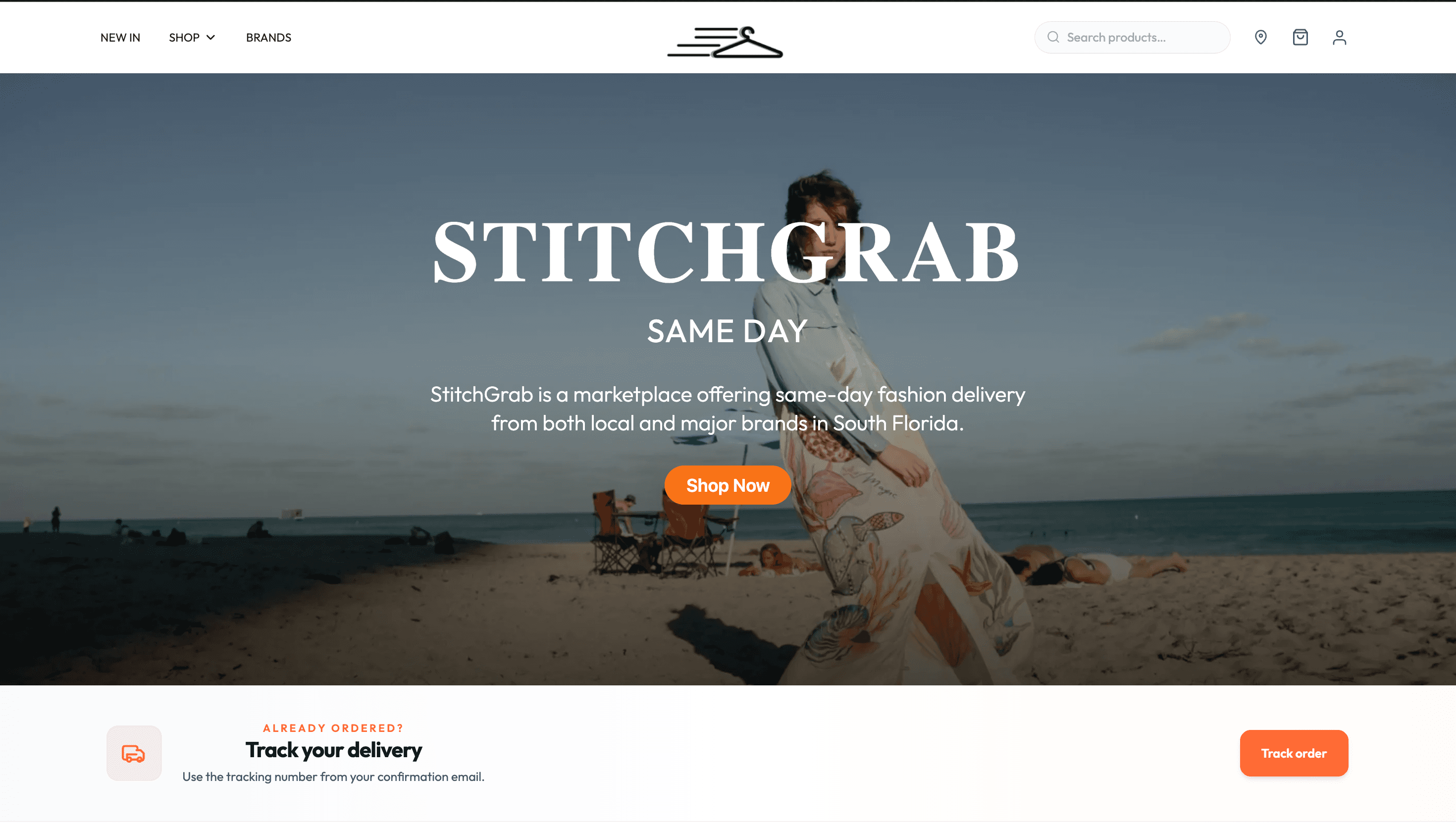 The StitchGrab storefront homepage, with a full-width hero reading STITCHGRAB SAME DAY and a track your delivery band beneath it.